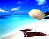 beach umbrela and towels